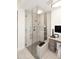Luxurious bathroom with walk-in shower, elegant tiling, and vanity area at 6166 N Scottsdale Rd # C4004, Paradise Valley, AZ 85253