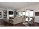 Spacious living and dining area with modern furnishings and decor at 6166 N Scottsdale Rd # C4004, Paradise Valley, AZ 85253