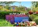 Enclave at Borgata sign with lush landscaping and building in background at 6166 N Scottsdale Rd # C4004, Paradise Valley, AZ 85253