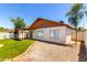 Spacious backyard featuring mature landscaping and a patio at 7056 W Caron Dr, Peoria, AZ 85345