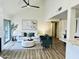 Comfortable living room with vaulted ceiling, modern decor, and abundant natural light at 7232 N Via Camello Del Norte -- # 3, Scottsdale, AZ 85258