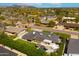 Aerial view of property in a lush neighborhood, highlighting a backyard pool and shaded patio at 7417 E Bonita Dr, Scottsdale, AZ 85250