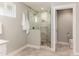 Elegant bathroom with modern glass shower and tiled flooring and toilet at 7417 E Bonita Dr, Scottsdale, AZ 85250