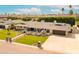 Beautiful one-story home with stone detail, fresh landscaping, and a well-manicured lawn in a desirable neighborhood at 7417 E Bonita Dr, Scottsdale, AZ 85250