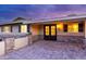 Charming exterior showcasing a well-manicured front yard, double door entry and beautiful stone accents at 7417 E Bonita Dr, Scottsdale, AZ 85250