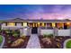 Inviting single-story home featuring a stone-accented facade, a walkway, and a well-maintained front yard at 7417 E Bonita Dr, Scottsdale, AZ 85250