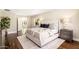 Spacious main bedroom with plush carpeting, side tables and comfortable king size bed at 7417 E Bonita Dr, Scottsdale, AZ 85250