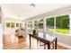 Bright sun room with floor to ceiling windows that lets in plenty of natural light at 7417 E Bonita Dr, Scottsdale, AZ 85250