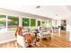 Cozy sun room with views of the backyard pool, featuring a comfortable seating area at 7417 E Bonita Dr, Scottsdale, AZ 85250