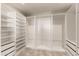 Spacious walk-in closet with custom shelving and drawers for optimal organization at 7417 E Bonita Dr, Scottsdale, AZ 85250