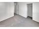 Neutral bedroom with carpet, a closet, and white walls, creating a calm atmosphere at 7720 W Pipestone Pl, Phoenix, AZ 85035