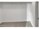 An empty walk-in closet with carpeted floor at 7720 W Pipestone Pl, Phoenix, AZ 85035