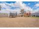 Spacious backyard with a trampoline, play structure, and potential for outdoor fun and relaxation at 8531 N 37Th Ave, Phoenix, AZ 85051