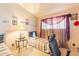 Comfortable bedroom with ample light, featuring twin beds, a shark plush and personalized decor at 8531 N 37Th Ave, Phoenix, AZ 85051