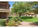 Exterior view showcases lush landscaping, mature trees, and well-maintained grounds at 8700 E Mountain View Rd # 2058, Scottsdale, AZ 85258