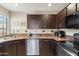 Well-maintained kitchen featuring granite countertops and modern stainless steel appliances at 8700 E Mountain View Rd # 2058, Scottsdale, AZ 85258