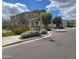 Charming two-story home featuring landscaped front yard, inviting entrance, and an attached two-car garage at 9207 W Sells Dr, Phoenix, AZ 85037