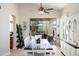 Bright dining area with hardwood floors, and sliding glass doors to the covered patio at 9475 N 115Th Pl, Scottsdale, AZ 85259