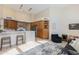 Open living space offers a kitchen view, high ceilings, and modern decor with lots of natural light at 9475 N 115Th Pl, Scottsdale, AZ 85259