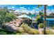 Community playground with modern equipment and shaded seating area, perfect for Gathering fun and recreation at 9475 N 115Th Pl, Scottsdale, AZ 85259