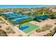 Community tennis courts with well-maintained surfaces, surrounded by lush landscaping, providing a great recreational space at 9475 N 115Th Pl, Scottsdale, AZ 85259