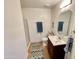 Cozy bathroom with glass door shower and dark wood vanity at 10249 N 12Th Pl # 2, Phoenix, AZ 85020