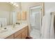 Bathroom featuring a large vanity and a view into the shower at 11216 E Appaloosa Pl, Scottsdale, AZ 85259