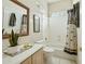 Well-lit bathroom featuring a shower and bath combination at 11216 E Appaloosa Pl, Scottsdale, AZ 85259