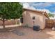 Large backyard features gravel and rock landscaping, offering a low-maintenance and serene outdoor space at 121 N Ramada --, Mesa, AZ 85205