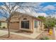 Charming single-story home featuring a two-car garage and low maintenance desert landscaping at 121 N Ramada --, Mesa, AZ 85205