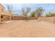 Wide angle backyard view highlighting a large, open space ideal for outdoor activities and entertainment at 14450 N 132Nd Dr, Surprise, AZ 85379