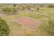 Aerial view of basketball court in a park surrounded by trees, open space and neighborhood amenities at 14450 N 132Nd Dr, Surprise, AZ 85379