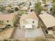 An aerial view of the property showcasing the backyard patio and neighborhood at 16157 W Moreland St, Goodyear, AZ 85338