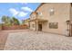 Spacious backyard featuring a covered patio and paver flooring, great for outdoor entertaining at 16157 W Moreland St, Goodyear, AZ 85338