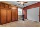 Bedroom featuring built-in wardrobe, workout bike, and cozy neutral carpet at 18187 E Via Jardin --, Gold Canyon, AZ 85118