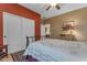 Cozy bedroom with white sliding door closet, rug, and warm lighting creating a relaxing atmosphere at 18187 E Via Jardin --, Gold Canyon, AZ 85118