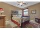 Bedroom with a decorative bed frame, area rug, and traditional decor at 18187 E Via Jardin --, Gold Canyon, AZ 85118