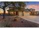 Charming single-Gathering home features a three-car garage and desert landscaping at 18187 E Via Jardin --, Gold Canyon, AZ 85118