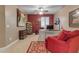 Home office features a red accent wall, vintage cabinet and large desk at 18187 E Via Jardin --, Gold Canyon, AZ 85118