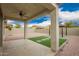 Covered patio in a low maintenance yard with gravel, artificial turf, and a gazebo, ready for entertaining at 1827 S 237Th Dr, Buckeye, AZ 85326