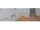 Laundry area with hookups and wood-look flooring at 1910 E Empeltre Rd, San Tan Valley, AZ 85140
