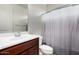 A well-lit bathroom features a single sink and toilet at 19740 W Sherman St, Buckeye, AZ 85326