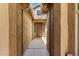 Inviting covered walkway leading to the front door of this charming home at 19740 W Sherman St, Buckeye, AZ 85326