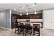Spacious kitchen with granite countertops, a large island, and stainless steel appliances at 19740 W Sherman St, Buckeye, AZ 85326