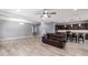 Spacious living room with an open floor plan to the kitchen at 19740 W Sherman St, Buckeye, AZ 85326