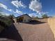 Expansive backyard space is xeriscaped with a covered patio, perfect for outdoor entertaining at 20917 N 37Th Pl, Phoenix, AZ 85050