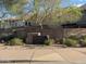 Stone signage for Saguaro Valley featuring desert landscaping and a view of nearby homes at 20917 N 37Th Pl, Phoenix, AZ 85050