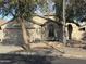 Charming single-story home featuring a two-car garage and low-maintenance desert landscaping at 20917 N 37Th Pl, Phoenix, AZ 85050