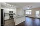 Modern kitchen with stainless steel appliances and granite countertop island at 2150 W Alameda Rd # 1122, Phoenix, AZ 85085