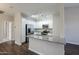 Bright modern kitchen with stainless appliances and a granite countertop island at 2150 W Alameda Rd # 1122, Phoenix, AZ 85085